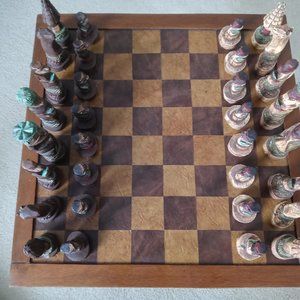 Large wood and leather vintage chess board with hand made pieces